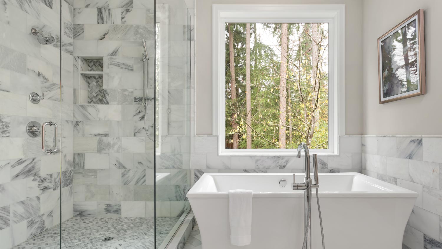 A bathroom with bathtub and shower