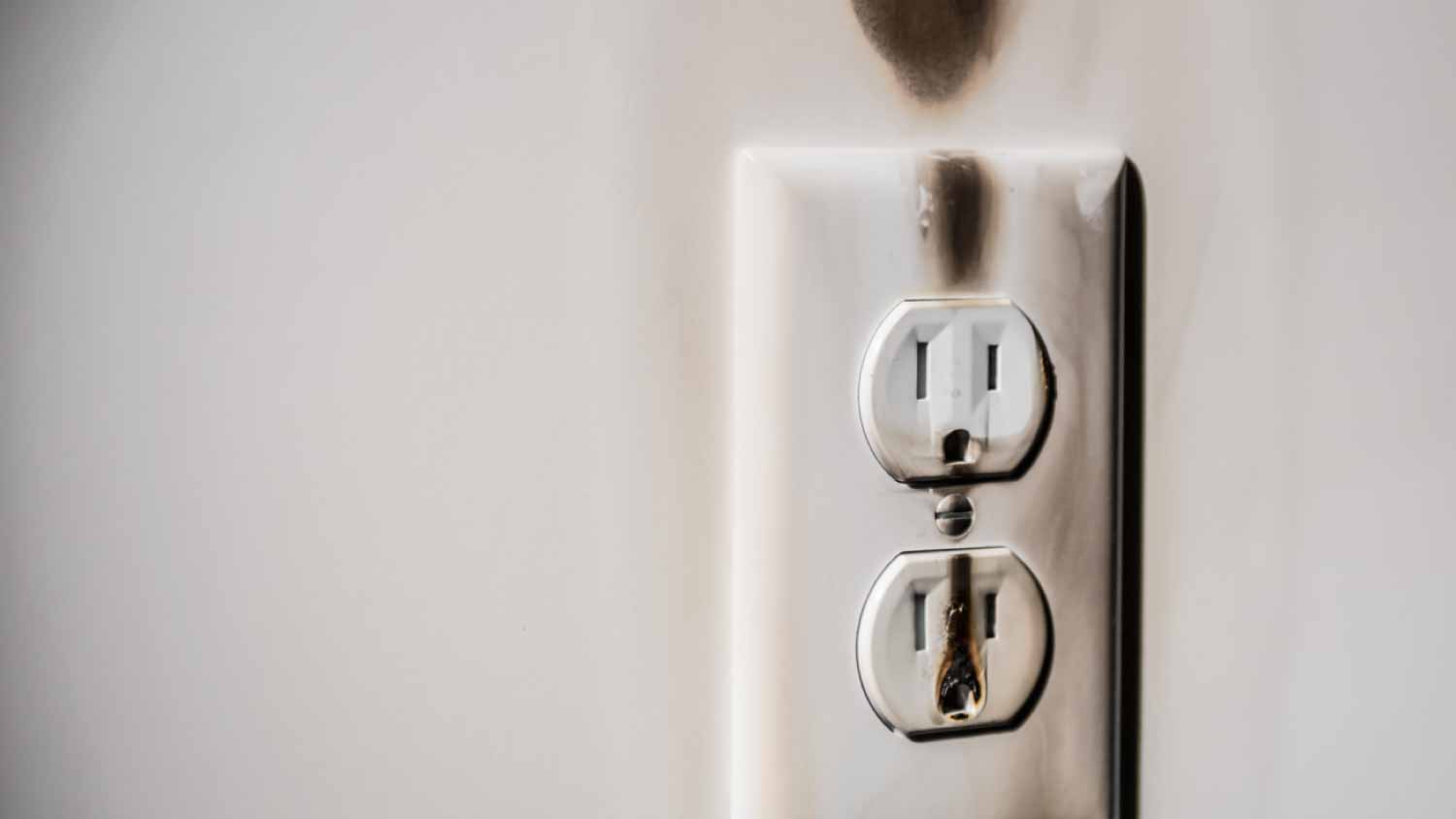 Burned electrical wall outlet
