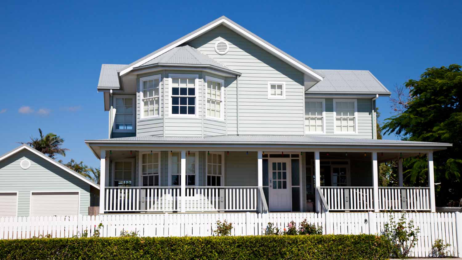 Colonial home with blue sky