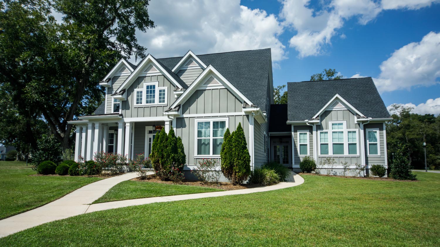 Gray new construction modern cottage home