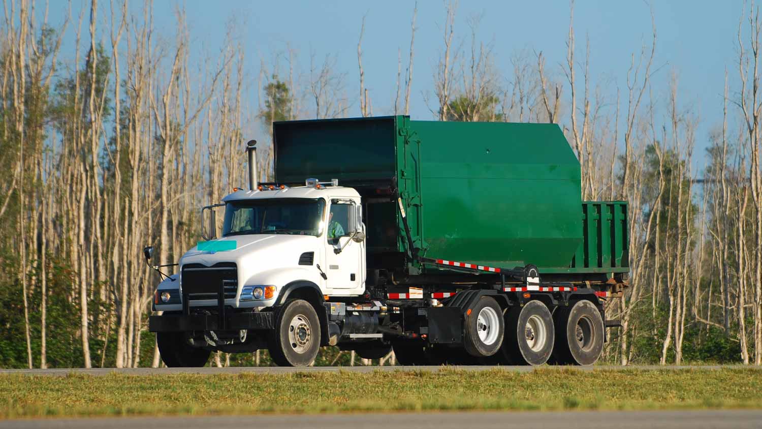 Green garbage truck
