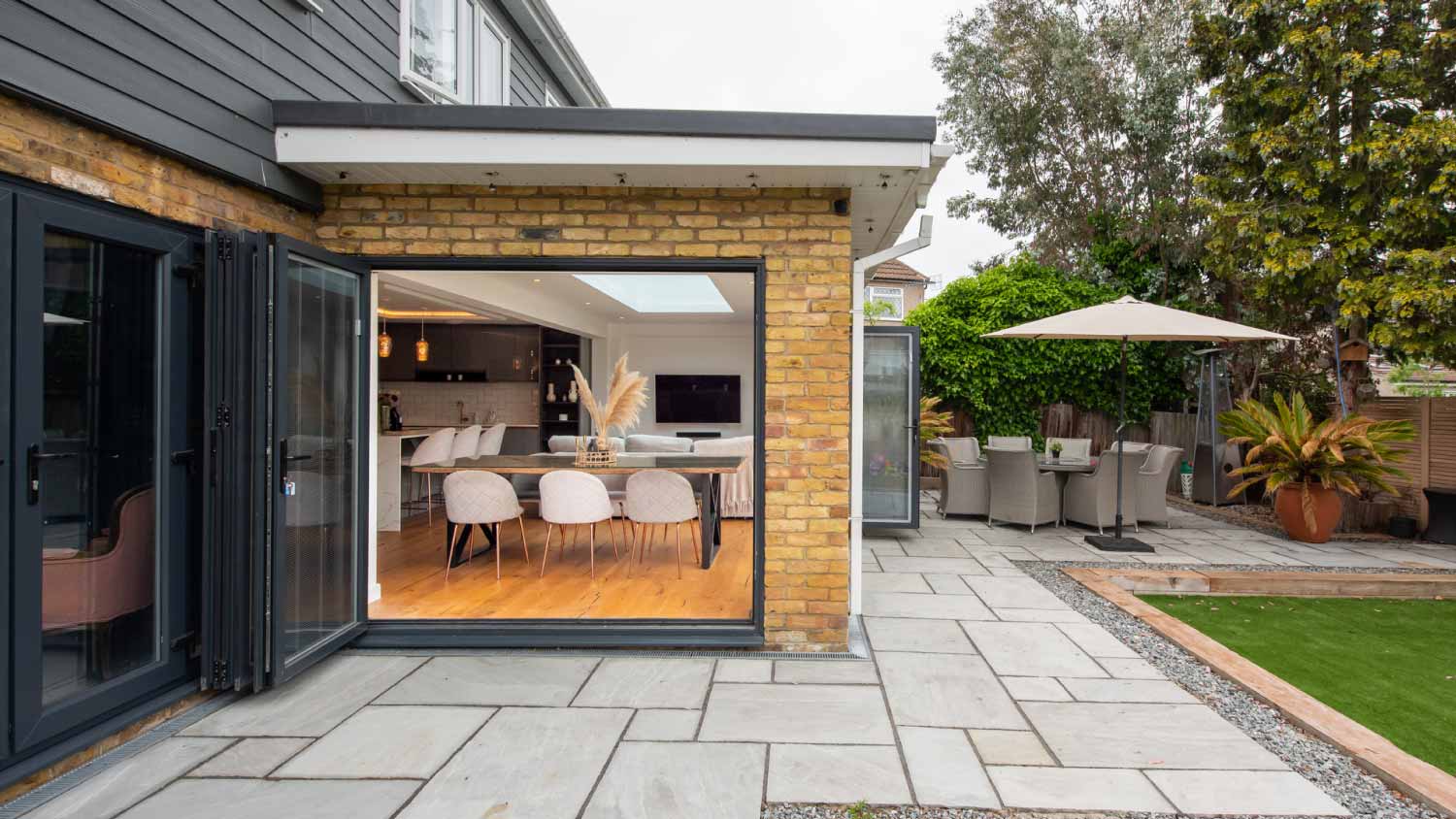 Home extension with open patio doors