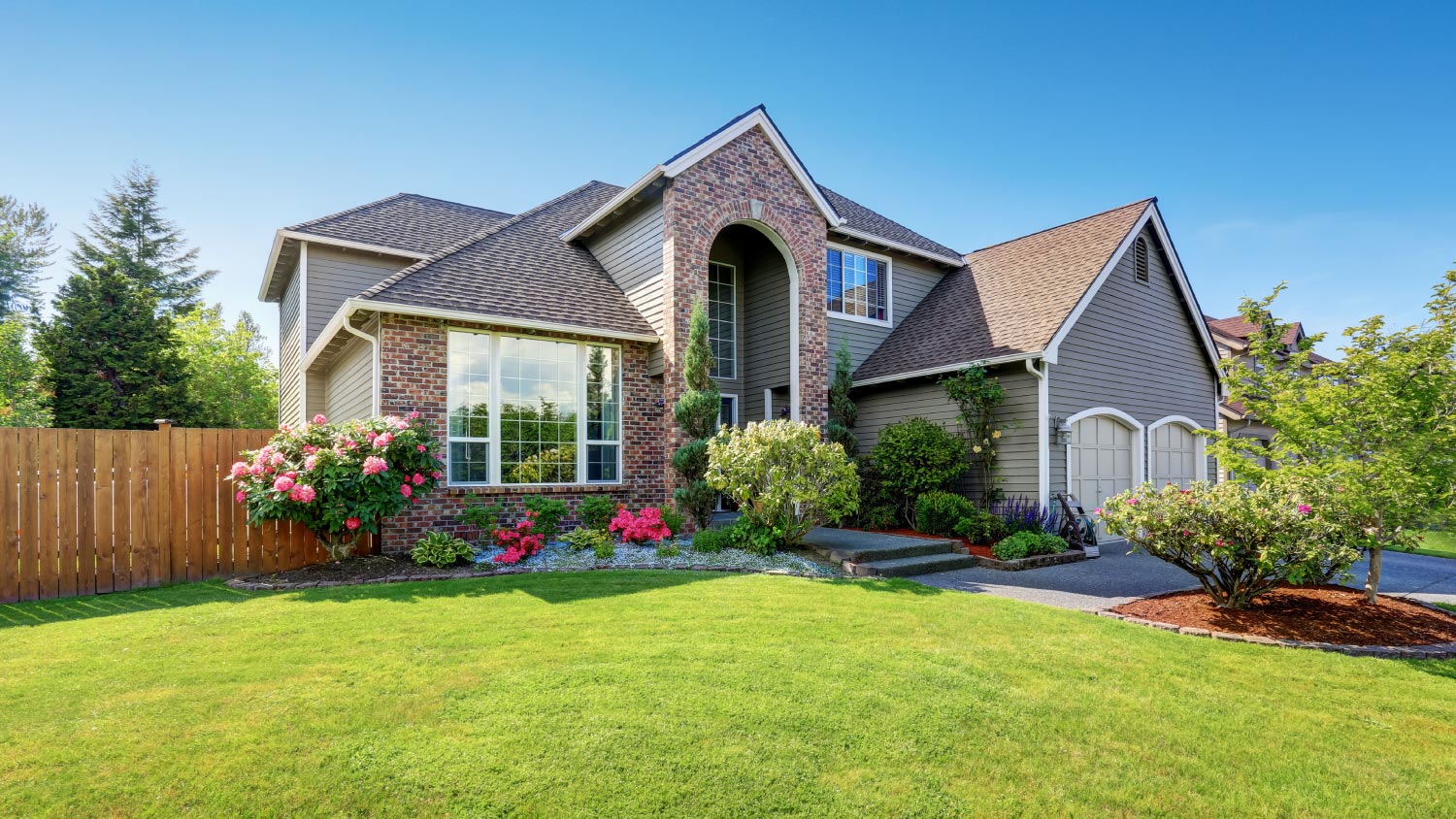 House exterior with brick and window film