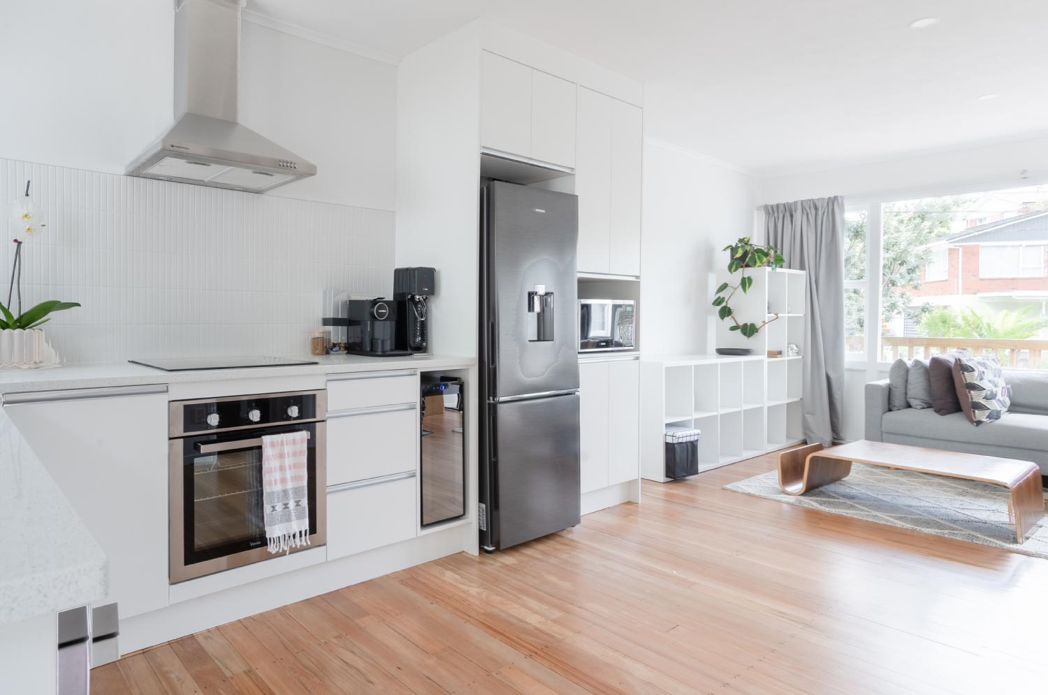 A renovated modern white kitchen