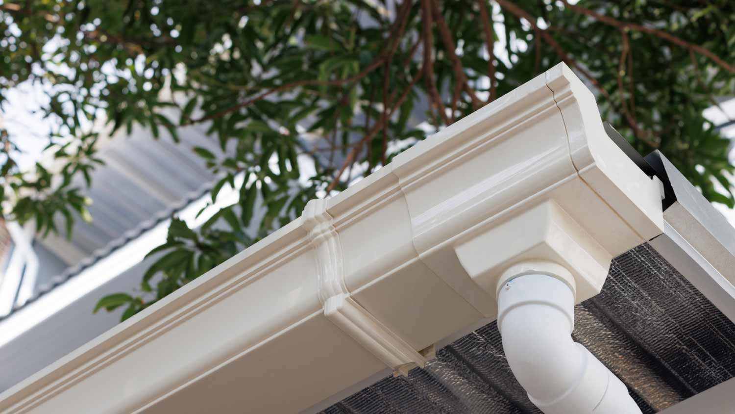 White plastic rain gutter