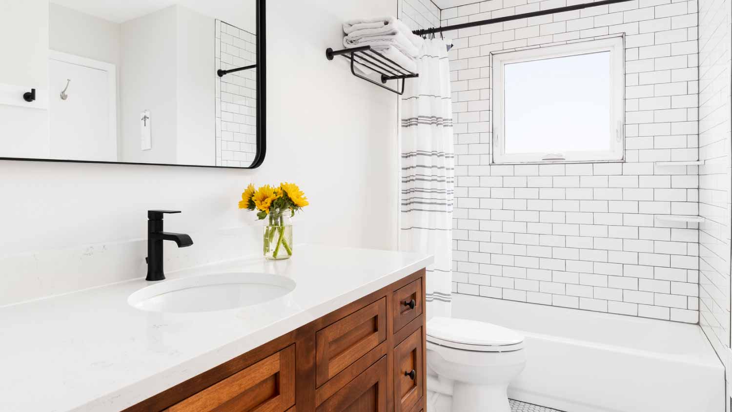 farmhouse bathroom with a wood cabinet