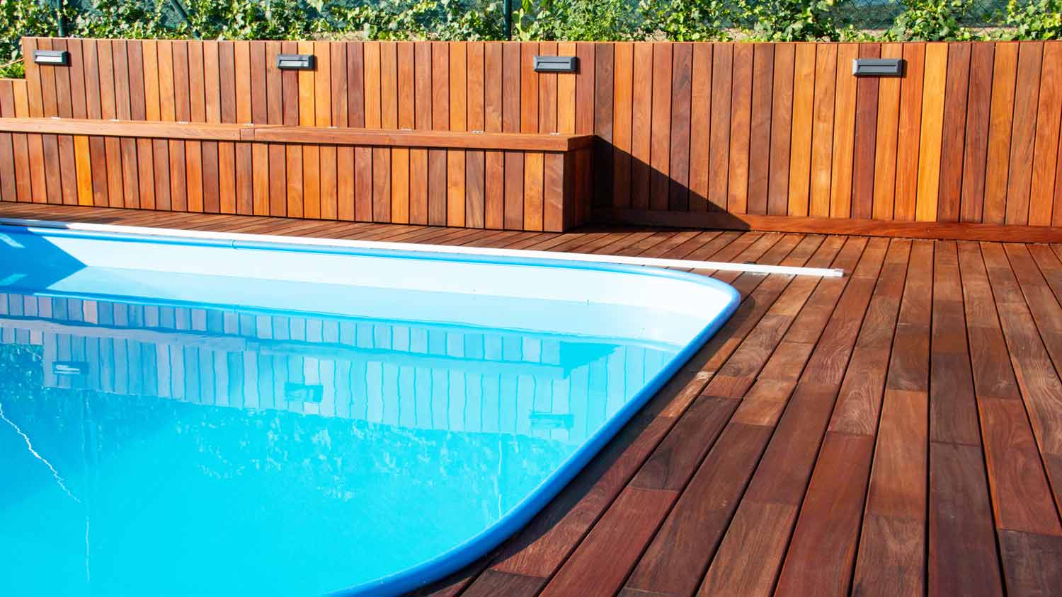Pool with a hardwood pool deck