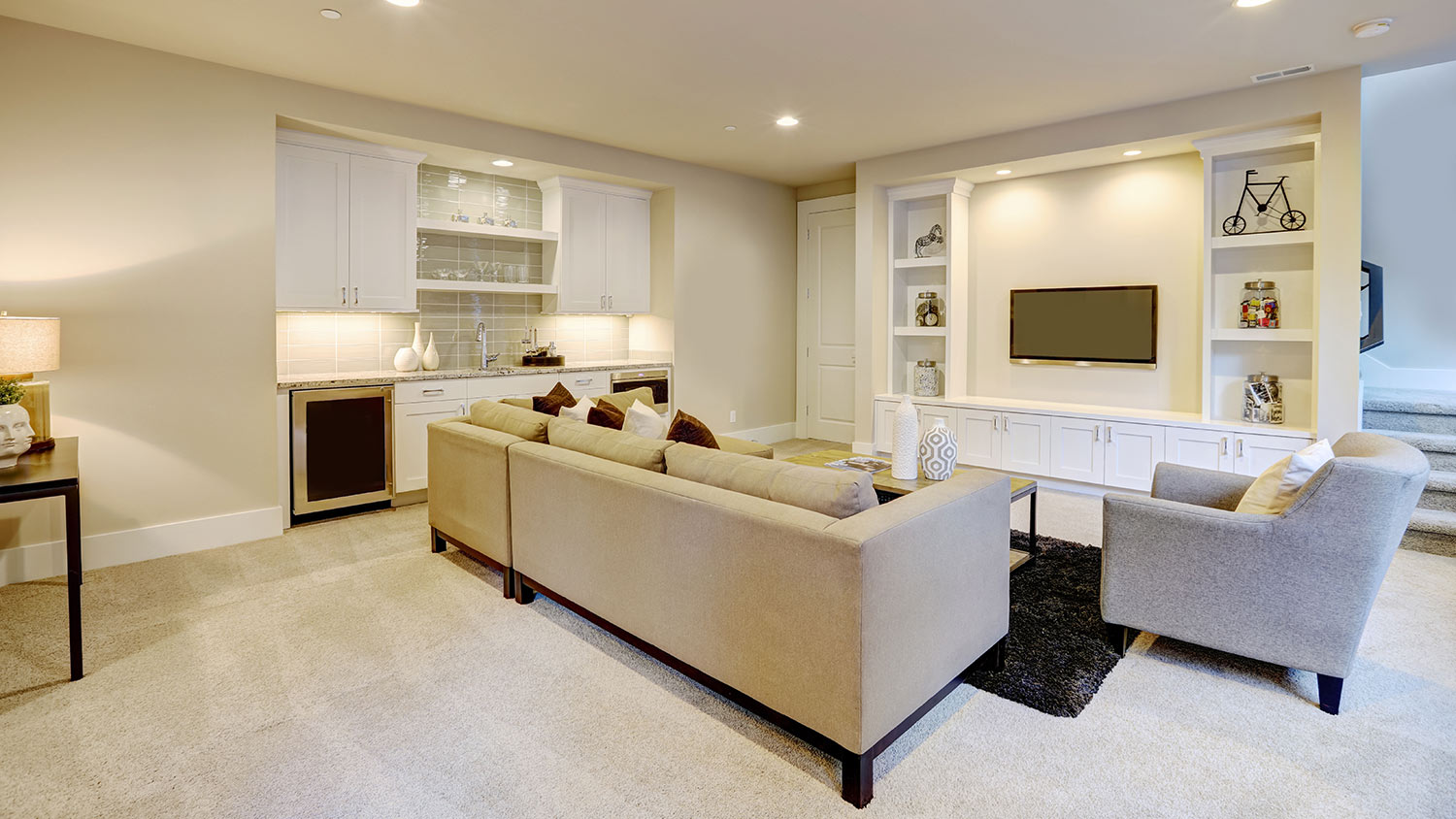 Basement living room with wet bar