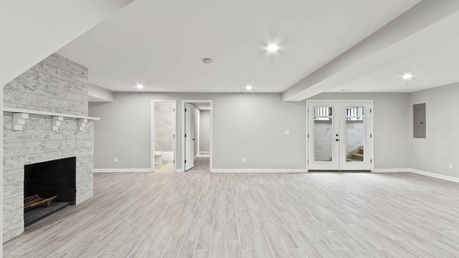 Basement room with fireplace