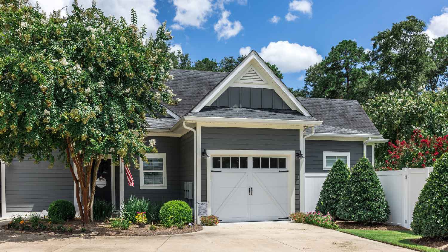 A beautiful house with a garage and a driveway
