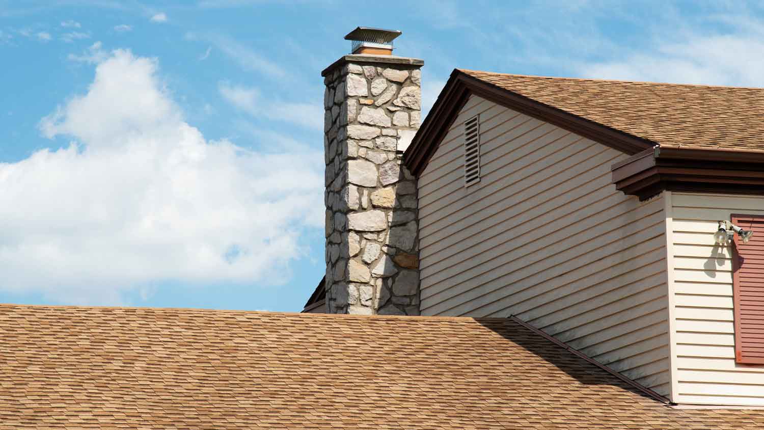 stone chimney on roof