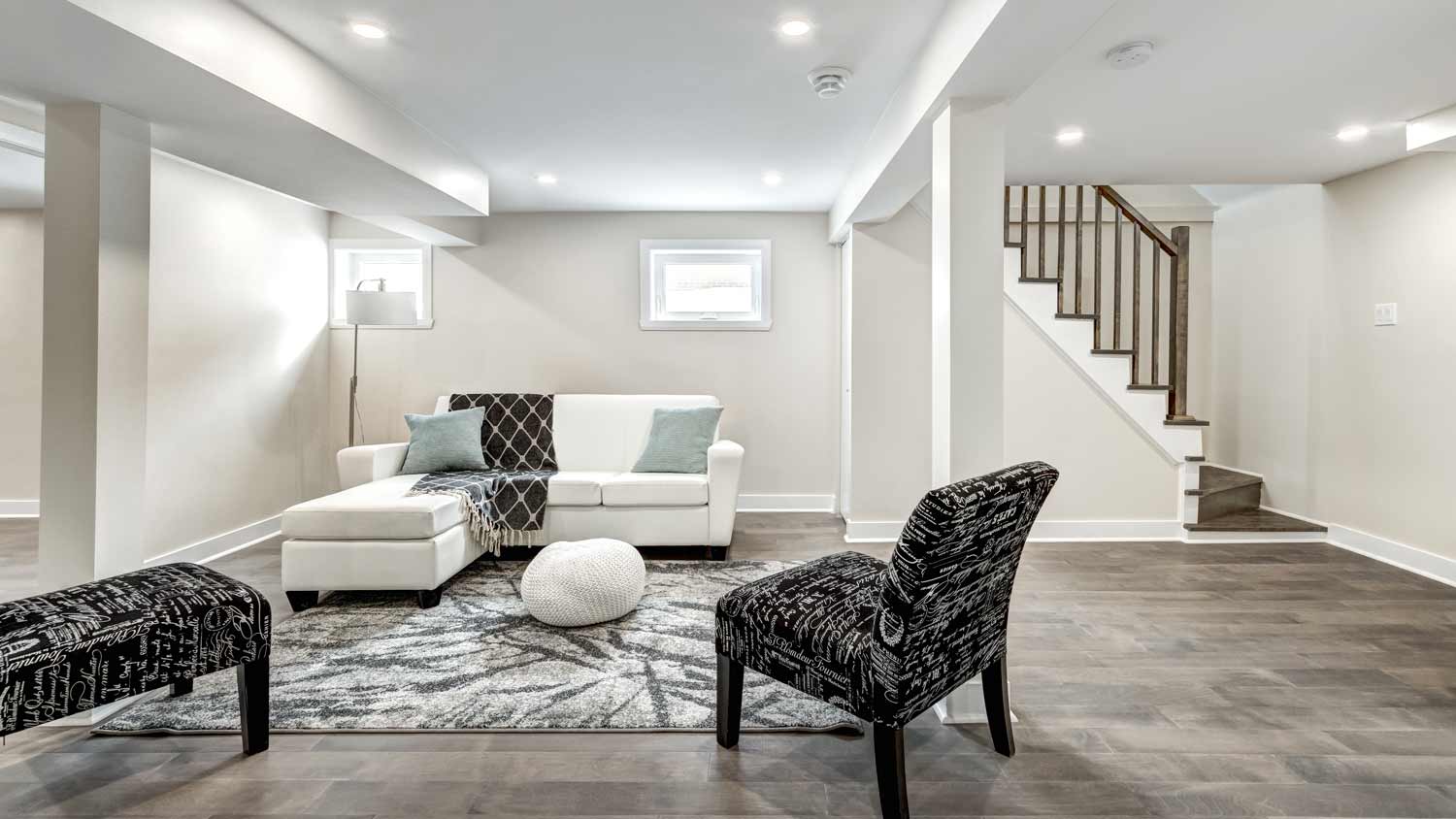 completely renovated living room in basement