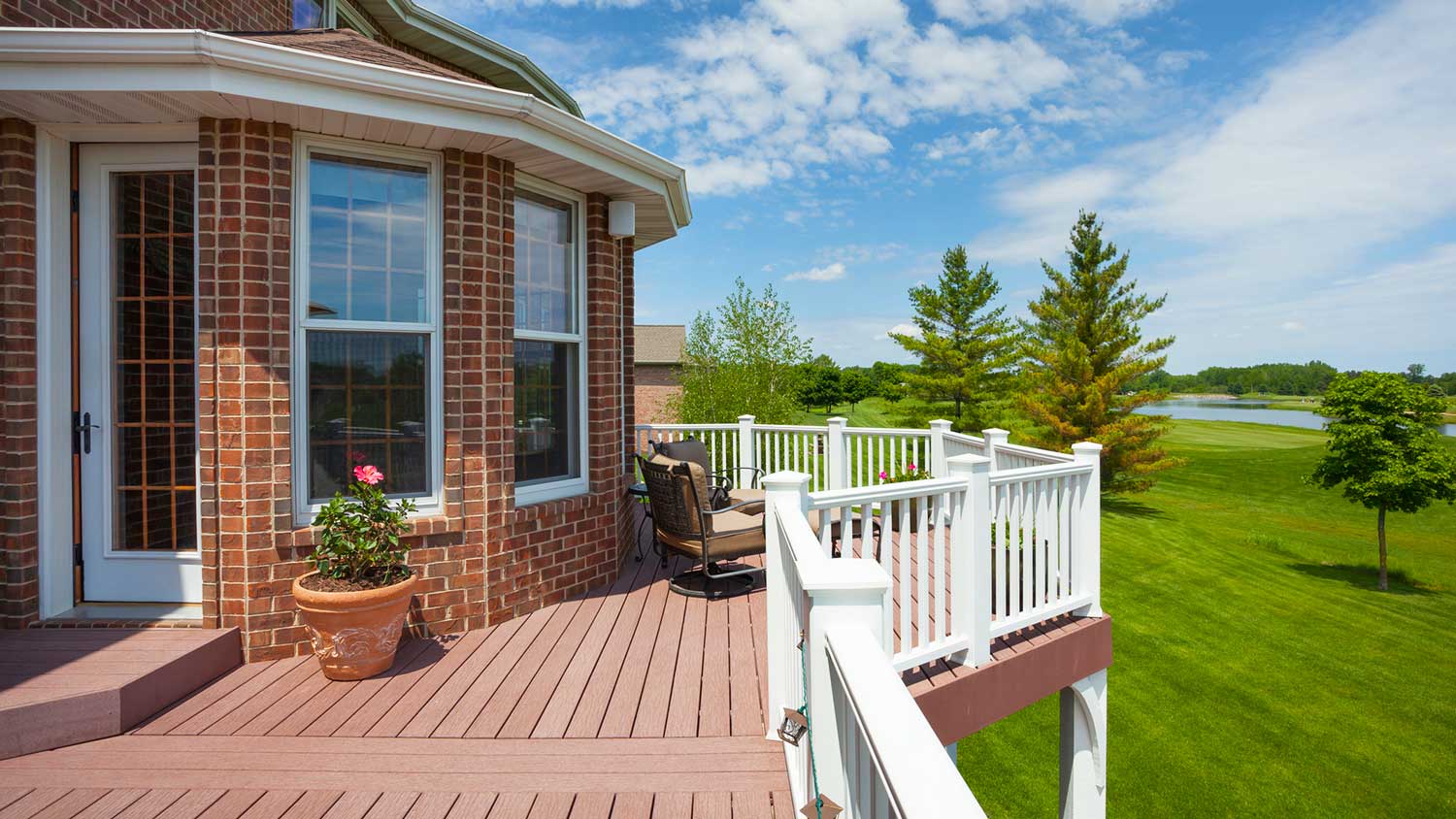 Home deck with view of golf course