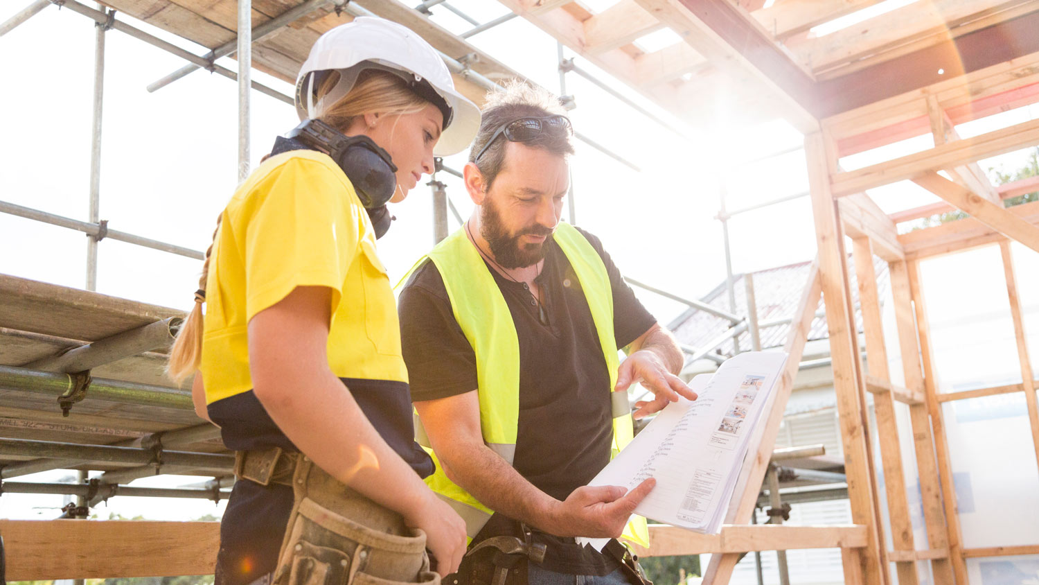 A contractor giving guidance to a worker