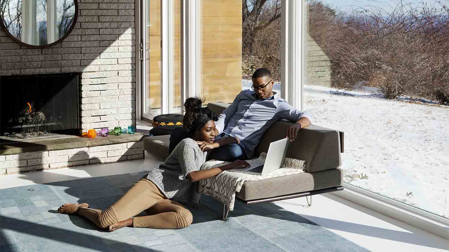 couple at home sitting in the living room