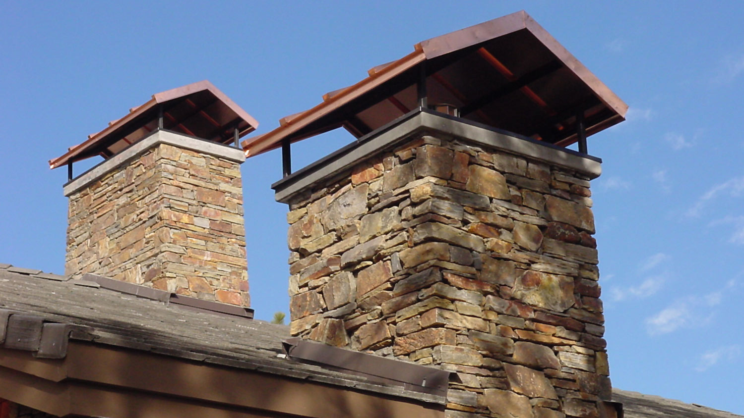 Chimney caps on stone chimney’s