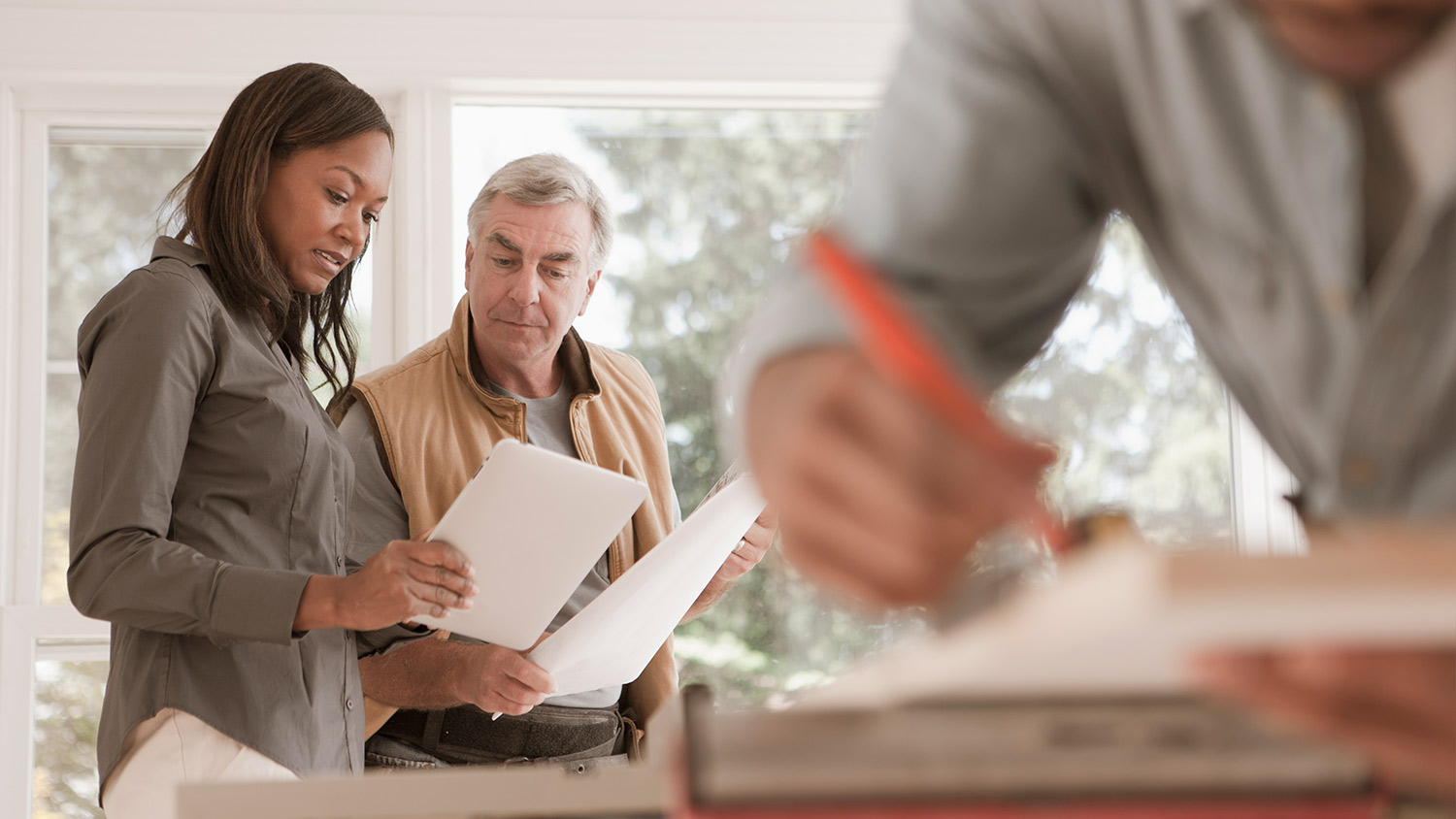 Homeowner talks to contractor