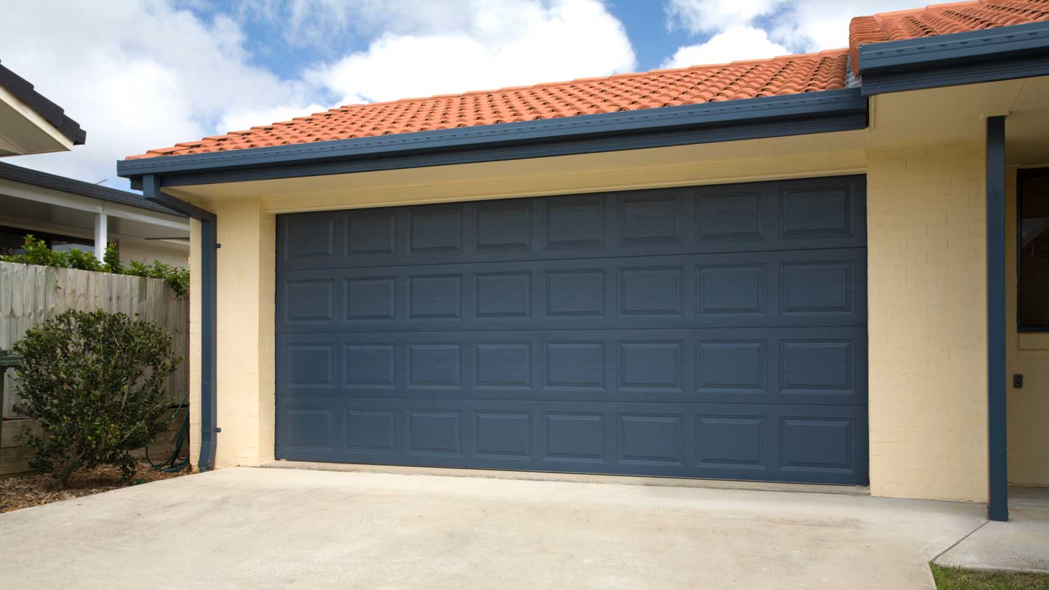 house with blue garage door