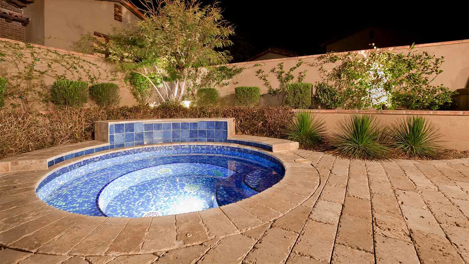 A view of an in-ground hot tub