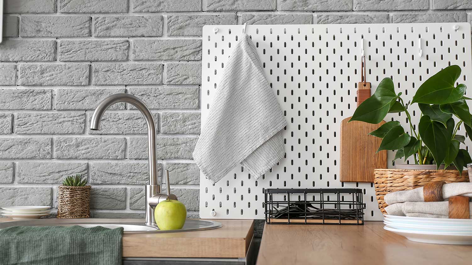 A view of a pegboard in a kitchen