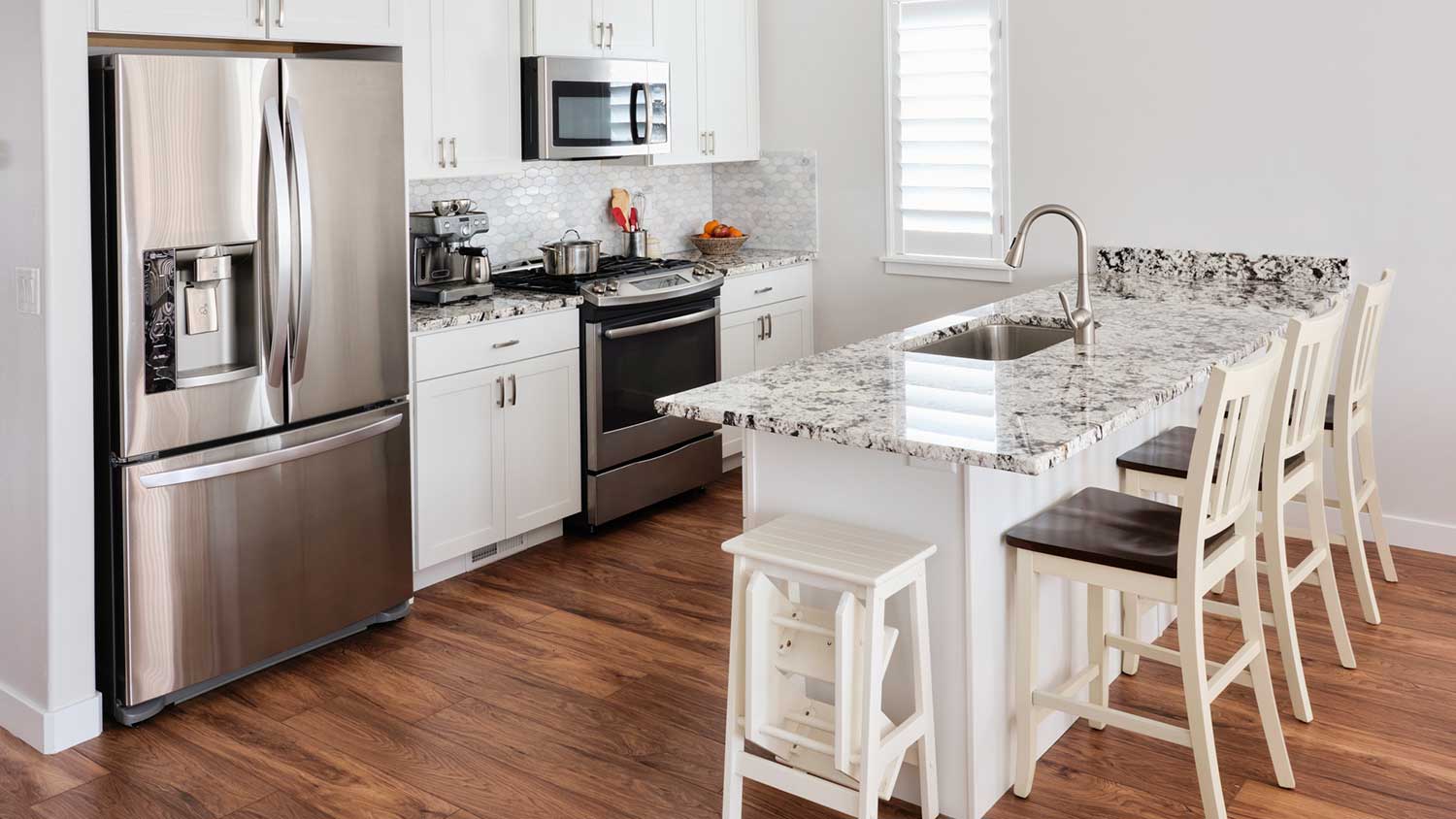 Kitchen with dining area and stainless-steel appliances