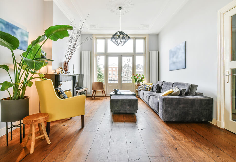Living room with rustic wood flooring