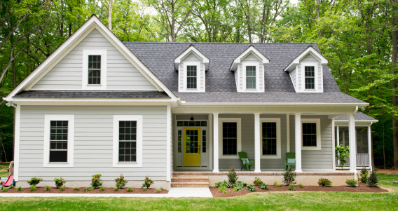 One and a half story house with concrete foundation