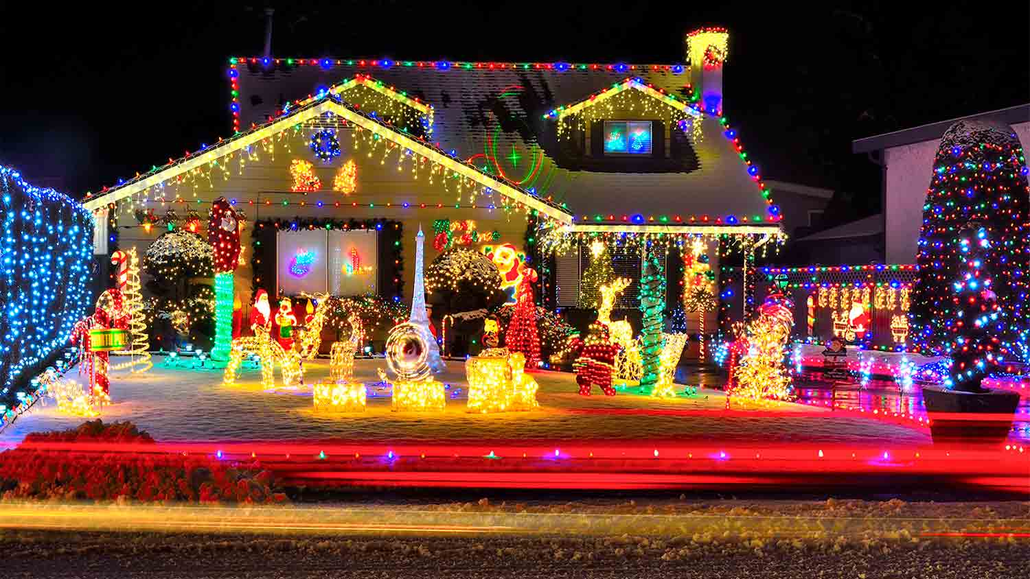 ouse with outdoor christmas lights on roof 