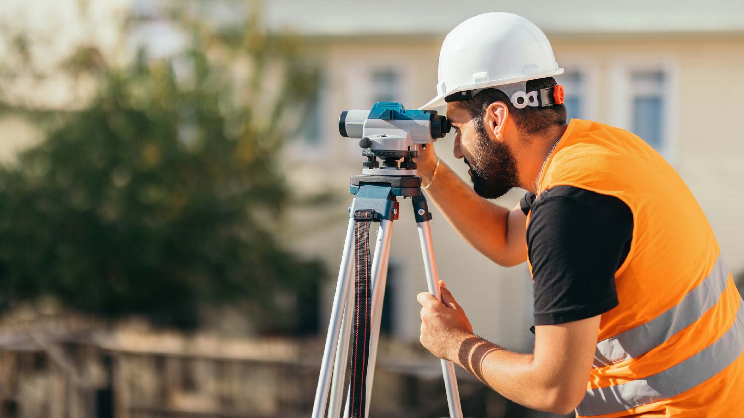 A professional doing a topographic survey