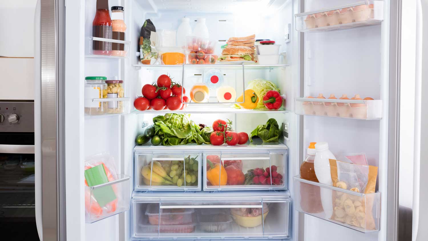 A refrigerator filled with fruits and vegetables