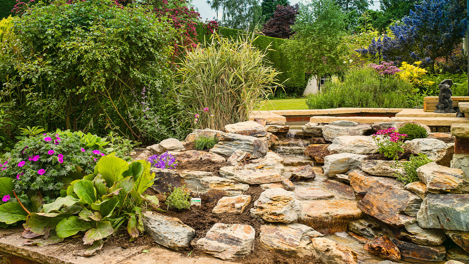 rock boulders waterfall landscaping 