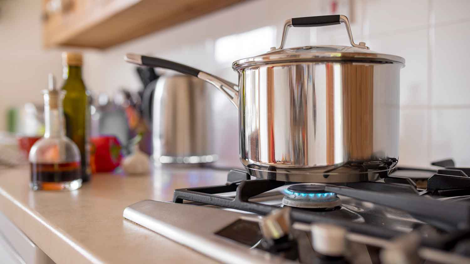Saucepan on top of a gas burner