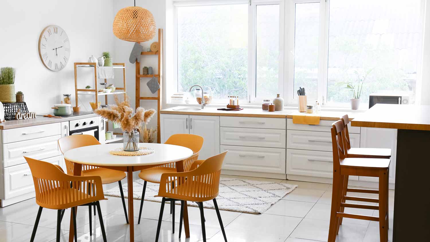 A spacious bright kitchen with large windows