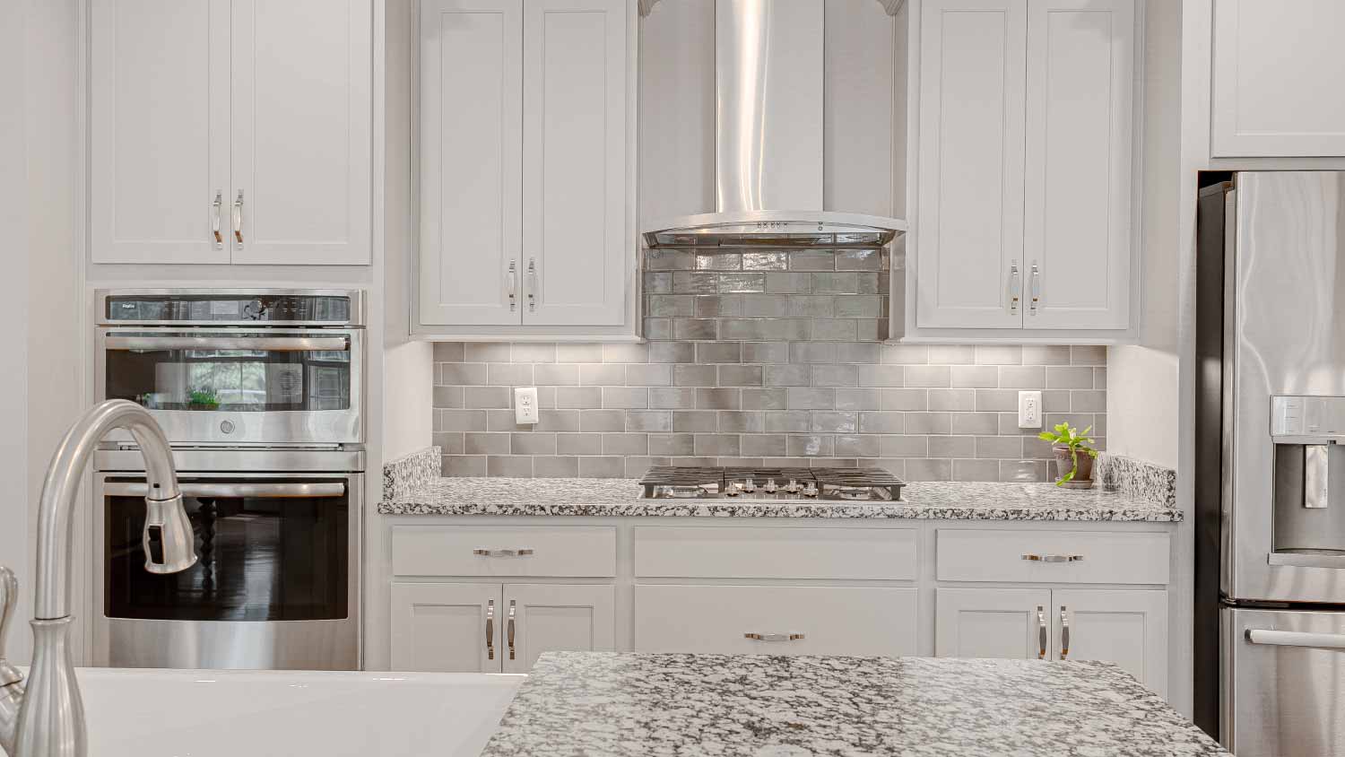 Bright white large modern kitchen